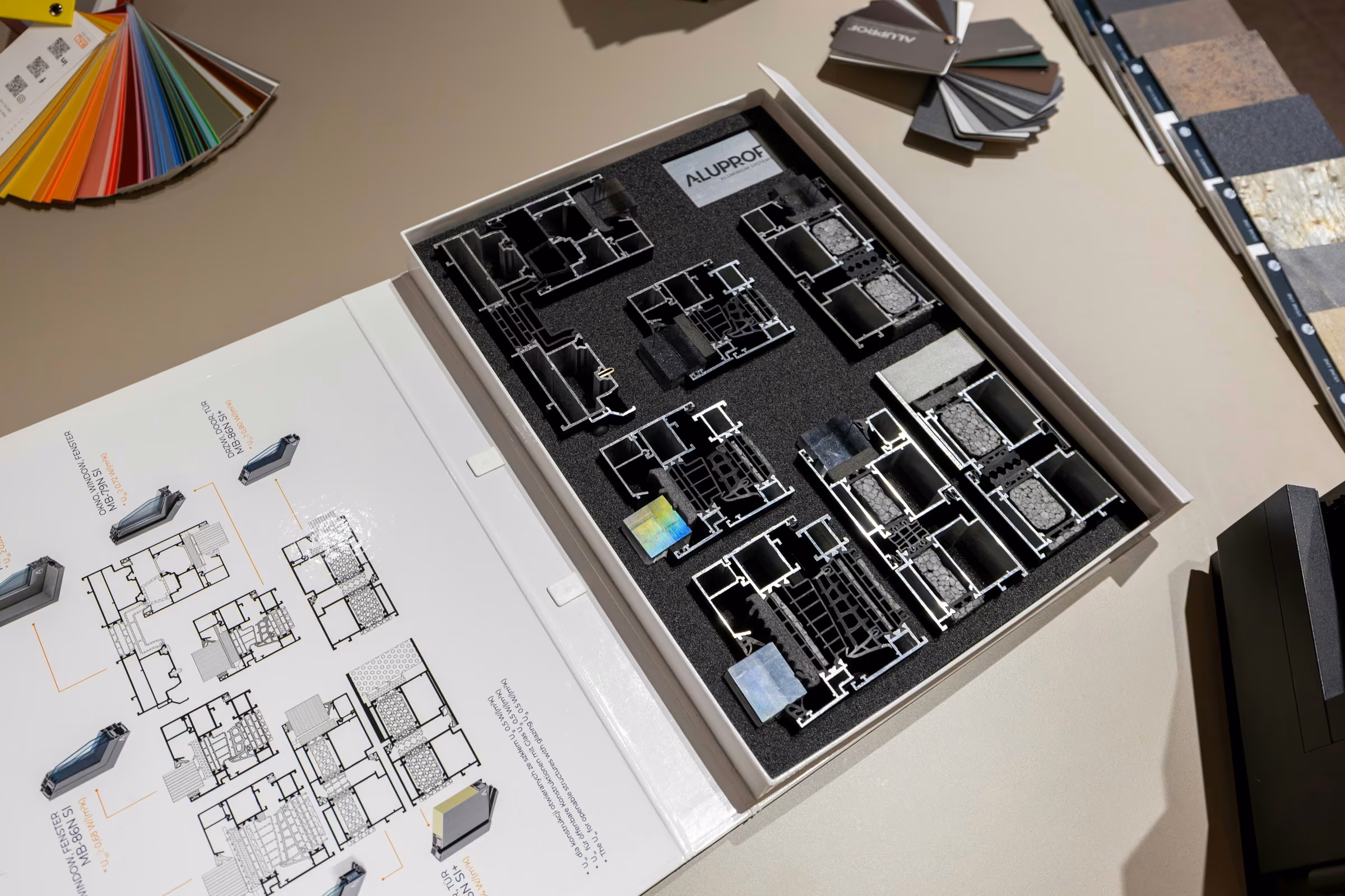 Catalogue of aluminium profile cross-sections alongside drawings and technical samples.